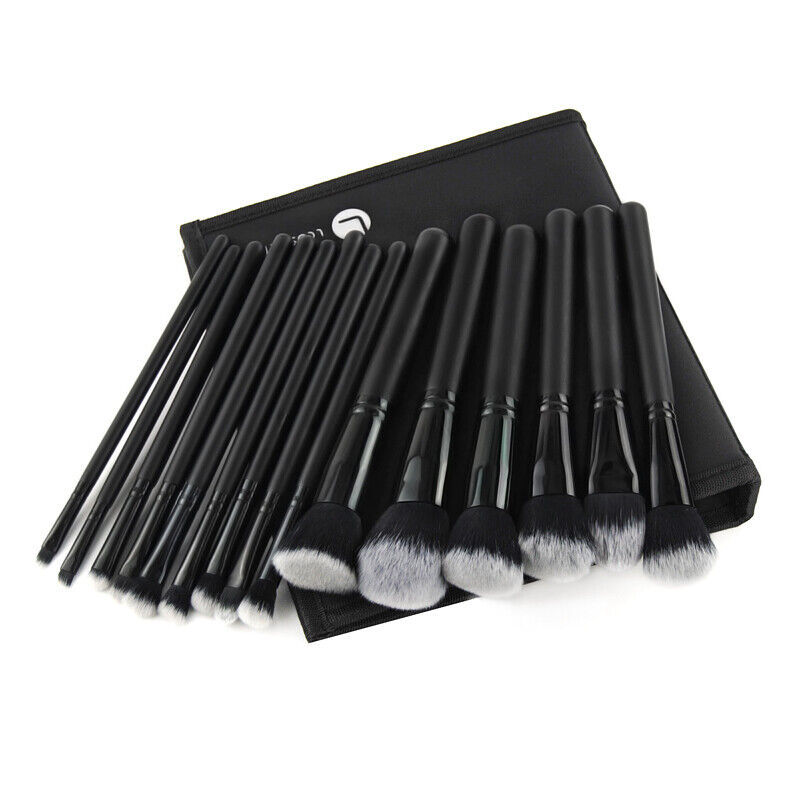 a group of makeup brushes