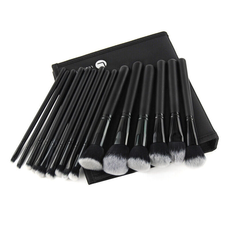 a group of makeup brushes