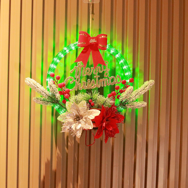 a green and red christmas wreath