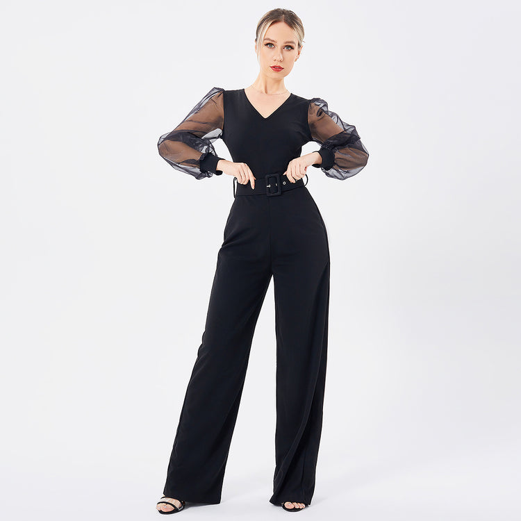 a woman in a black jumpsuit
