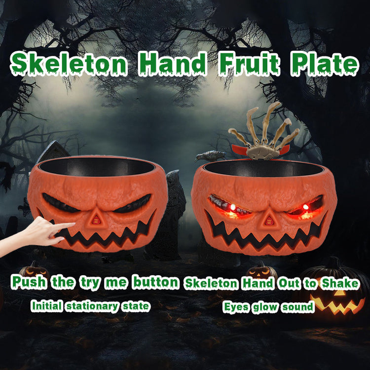 a hand pointing at a pumpkin bowl