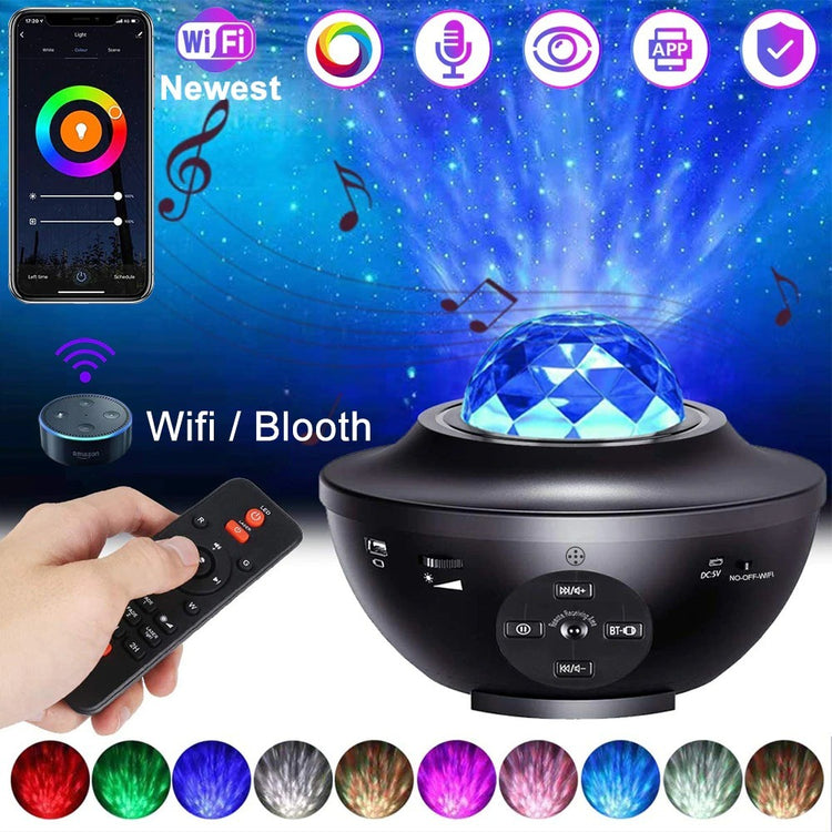 a hand holding a remote control next to a black object with a blue ball