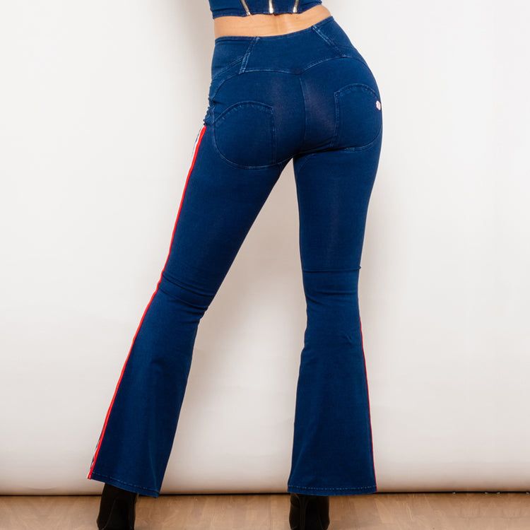 a woman wearing blue jeans