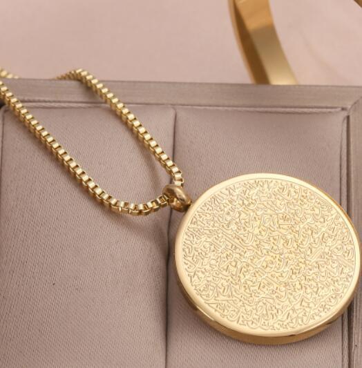 a gold medallion on a chain