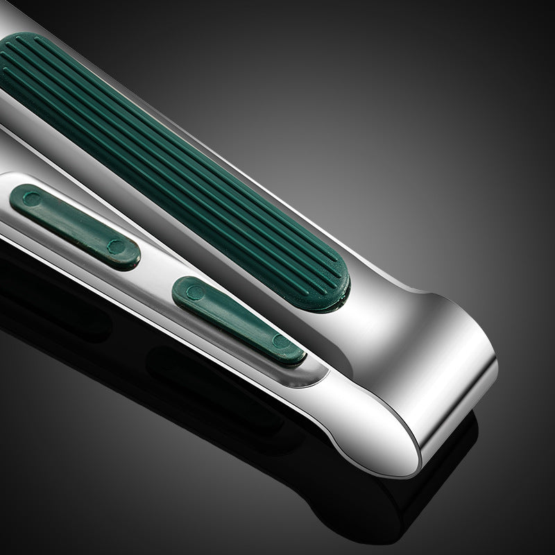 a metal and green tool