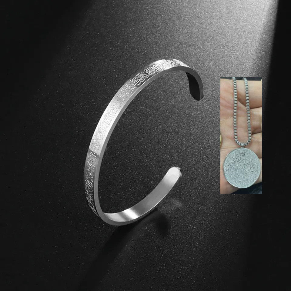 a silver bracelet with a coin on it