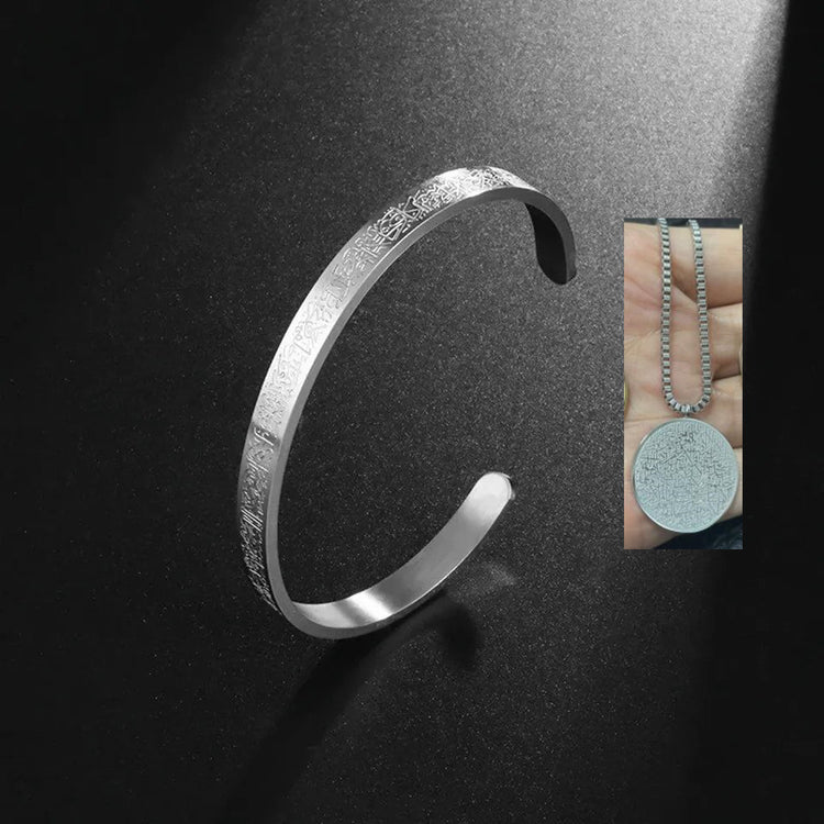a silver bracelet with a coin on it