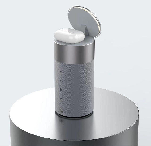 a white earbuds on a round silver cylinder