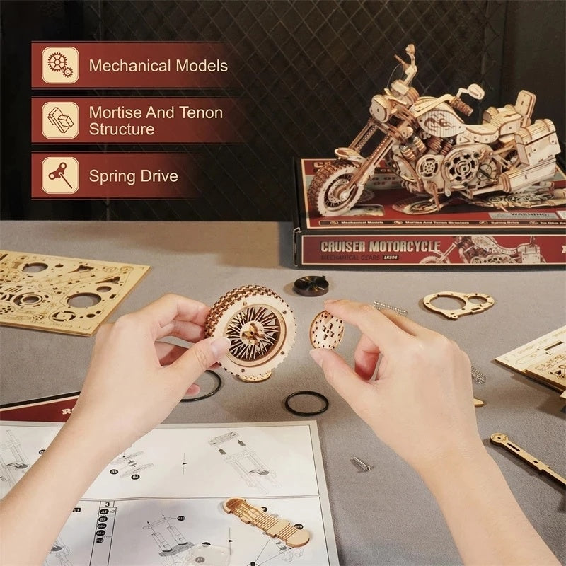 a person's hands embling a motorcycle