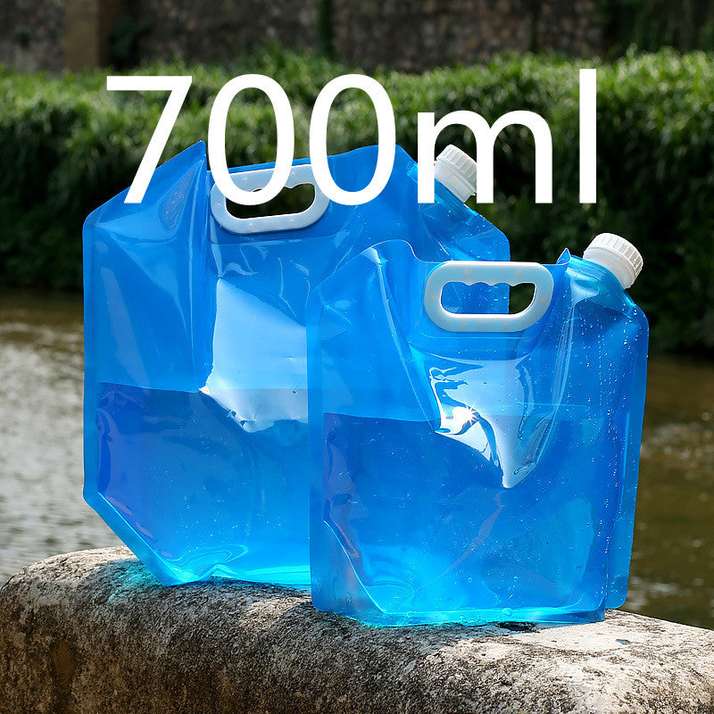 two blue plastic jugs on a rock