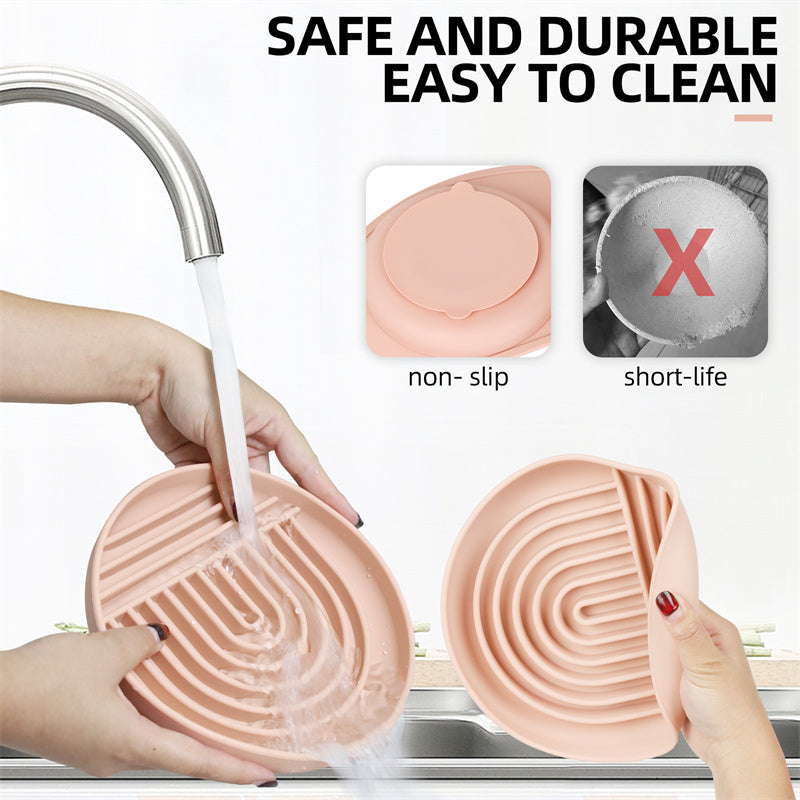 a person washing dishes with a faucet