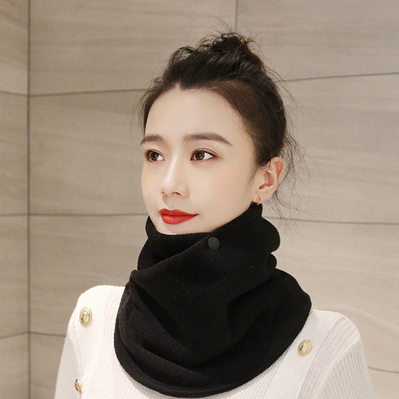 a woman wearing a scarf