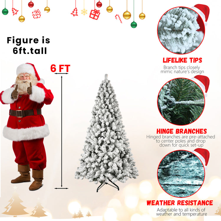 a man in a garment standing next to a christmas tree