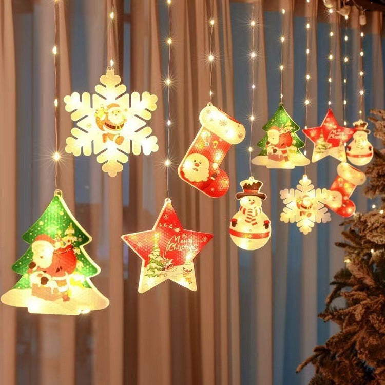 a group of christmas ornaments from a curtain