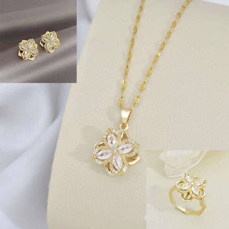 a gold necklace and earrings