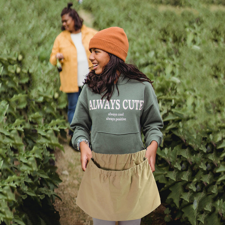 a woman in a field of plants