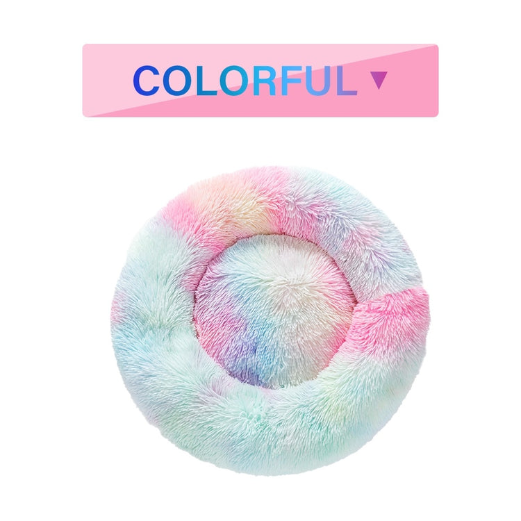 a colorful furry pillow on a white background