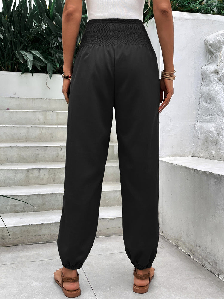 a person wearing black pants