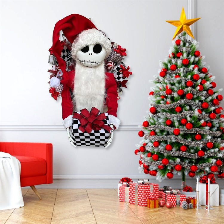 a christmas tree with a stuffed toy and a red chair