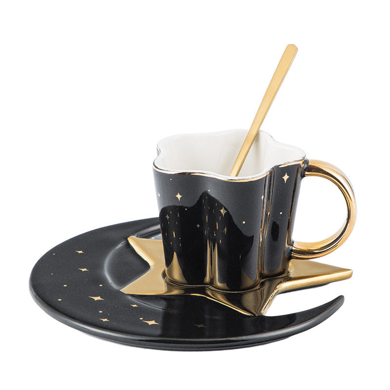 a cup with a spoon on a plate