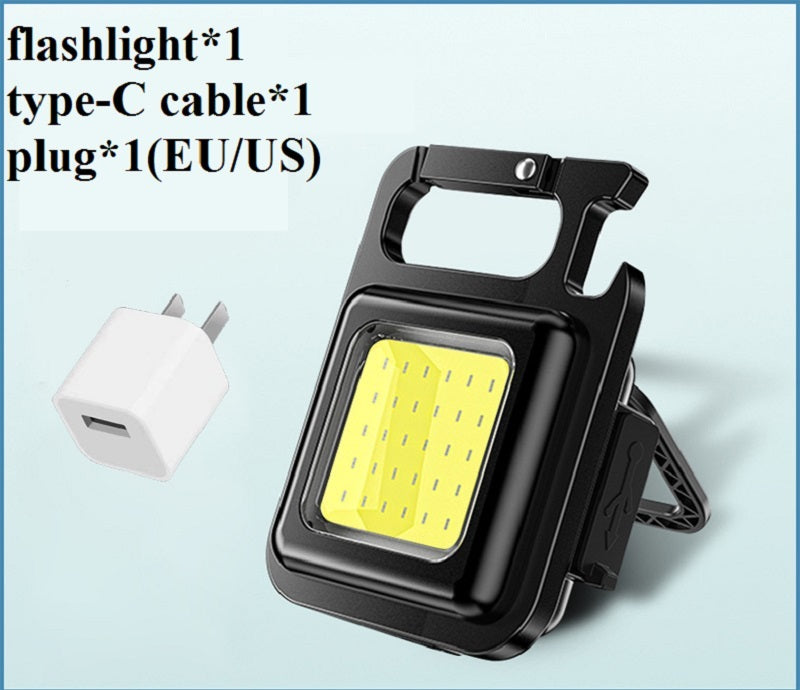 a black and yellow light with a white charger