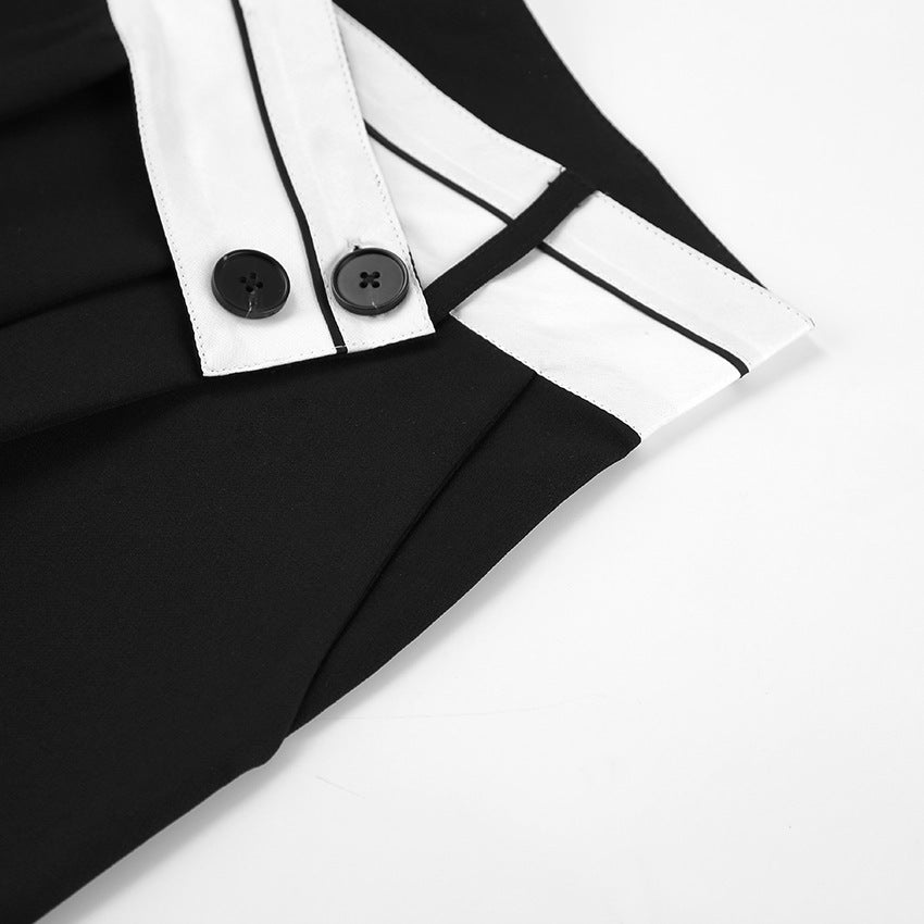 a close up of a black and white pants
