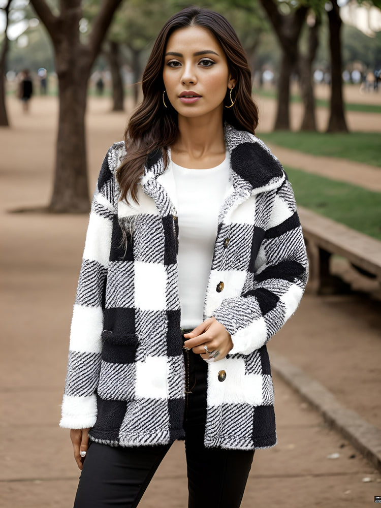 a woman standing outside in a park