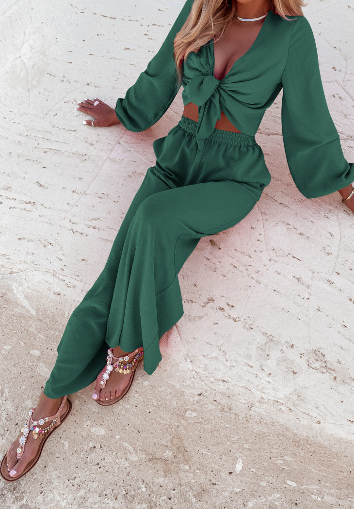 a woman wearing a green outfit