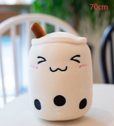 a white stuffed animal on a white table