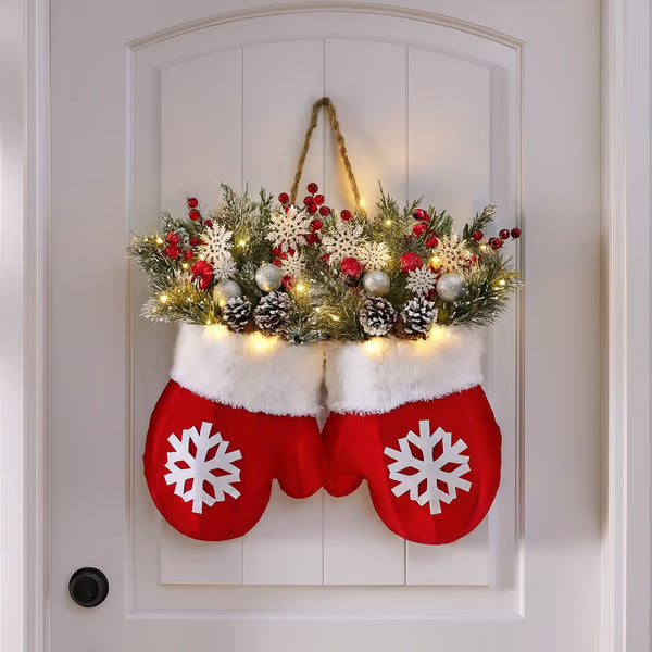a pair of mittens on a door
