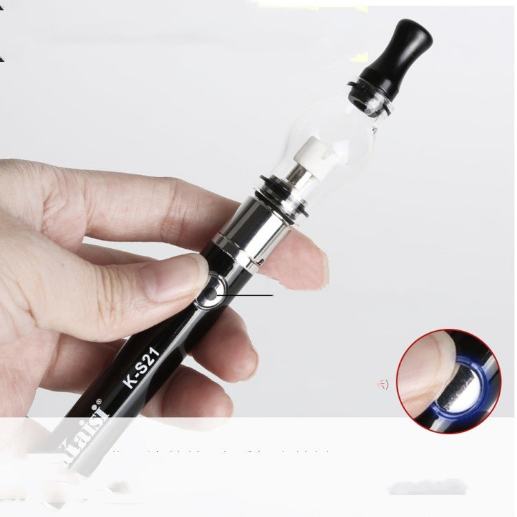 a hand holding a vaporizer