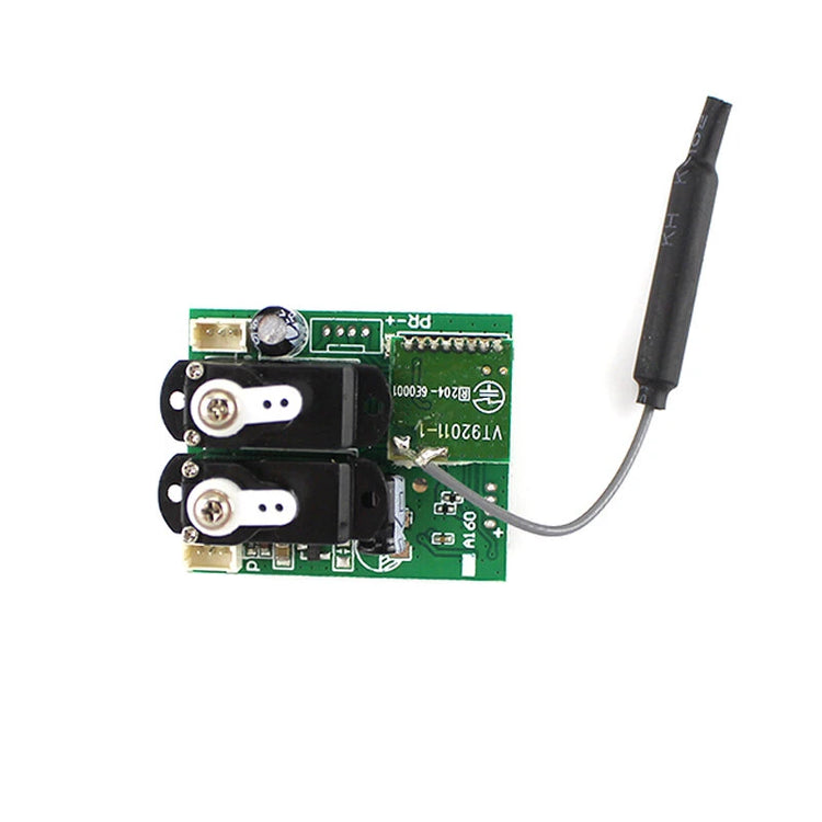 a green circuit board with black wires