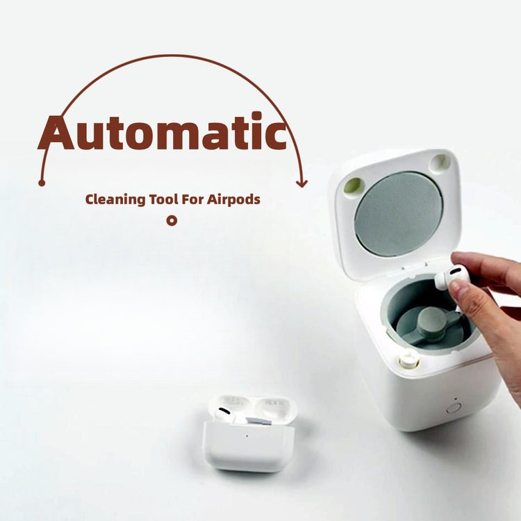 a hand holding a white earbud