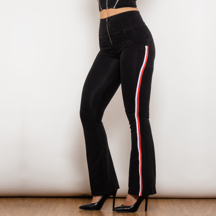 a woman wearing black pants