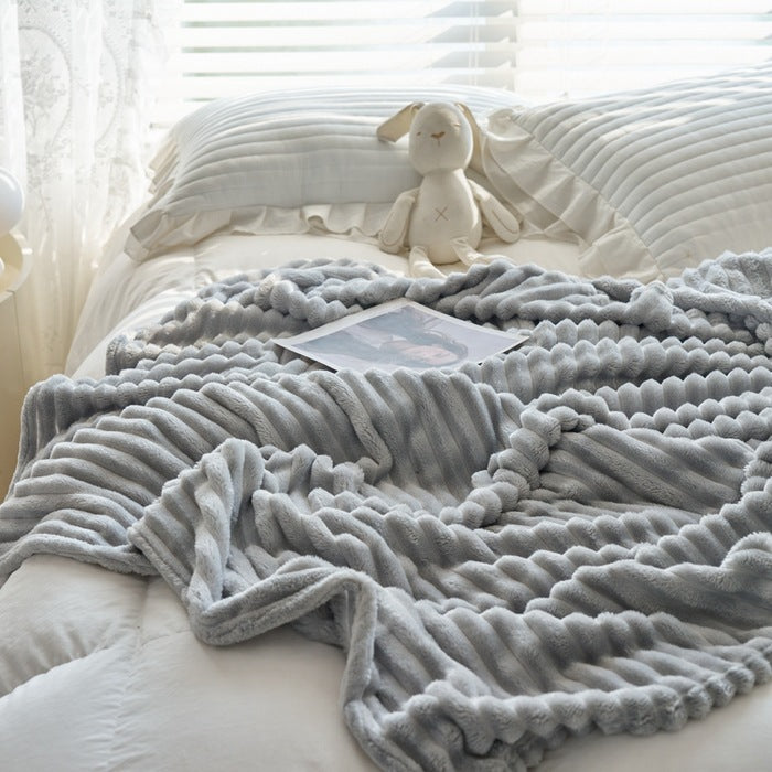 a blanket on a bed