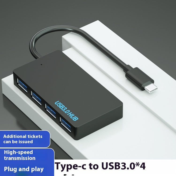 a black usb hub with a cable