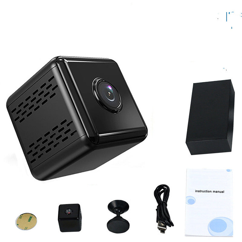 a black cube with a round lens