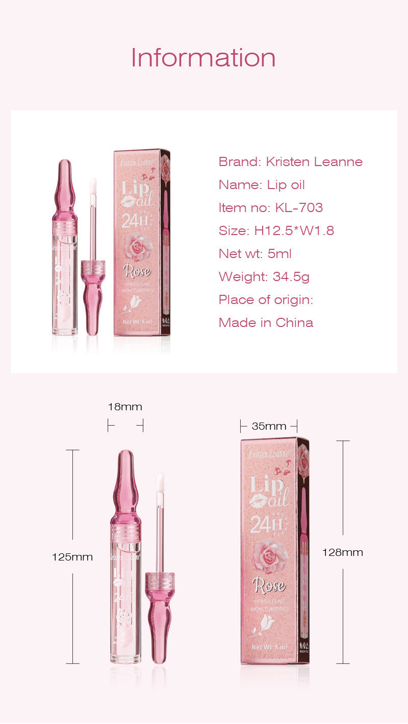 a pink lip oil and a box