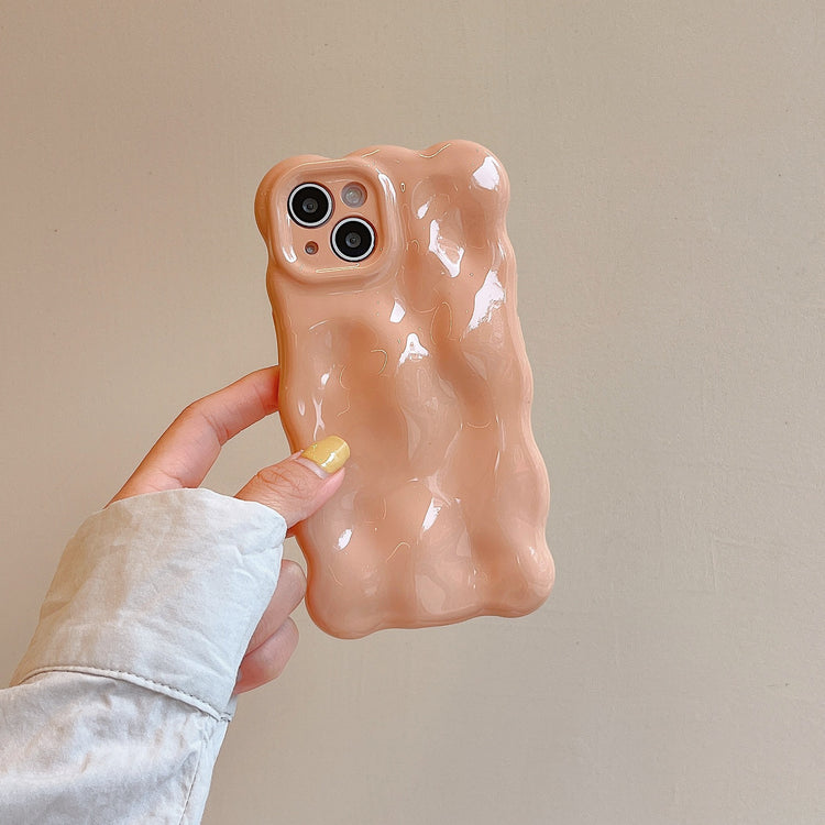 a hand holding a cell phone