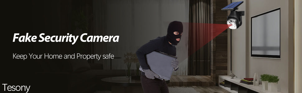 a man wearing a mask and holding a laptop