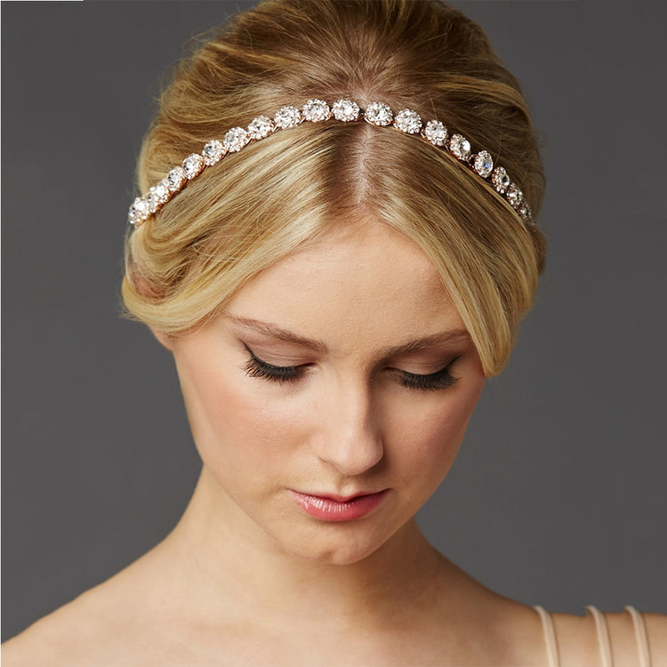 a woman with a headband in her hair
