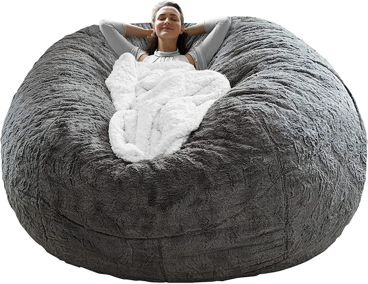 a woman lying in a bean bag chair