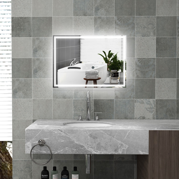a bathroom sink with a mirror above it