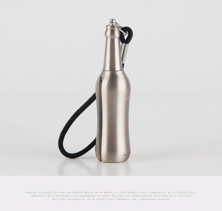 a silver bottle with a black strap