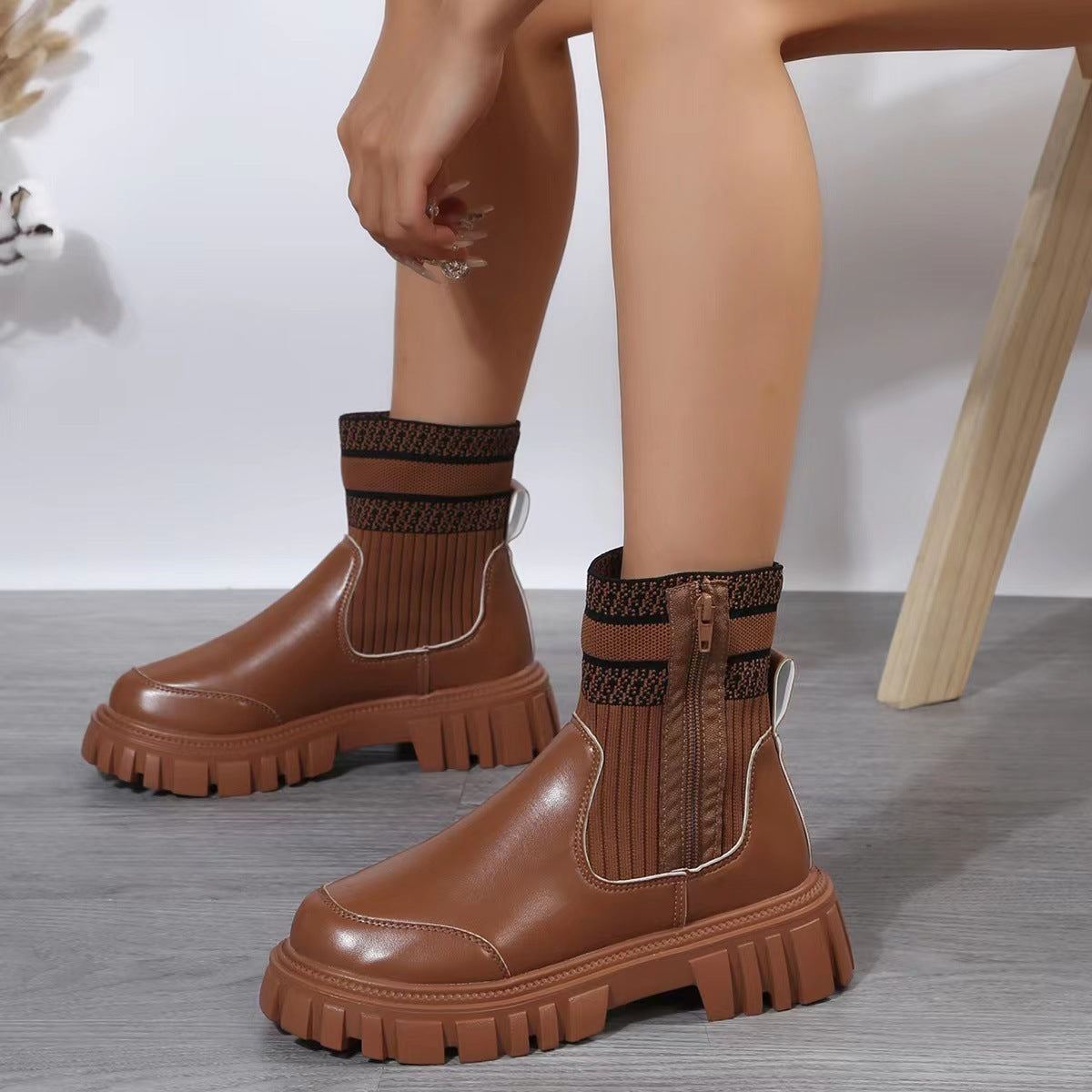 a person wearing brown boots