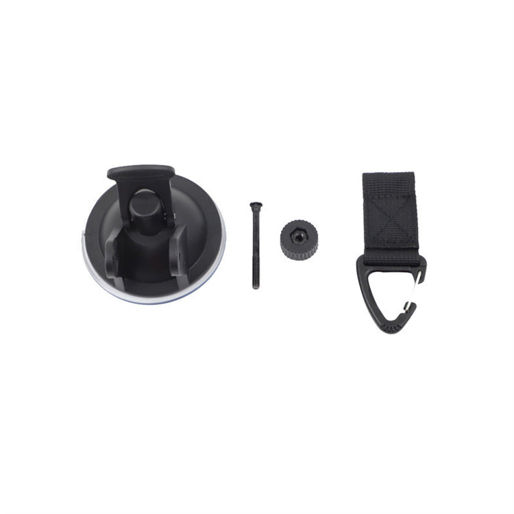 a suction cup with a strap and screw