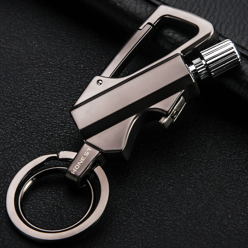 a key chain on a leather surface