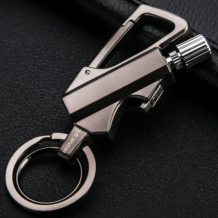 a key chain on a leather surface