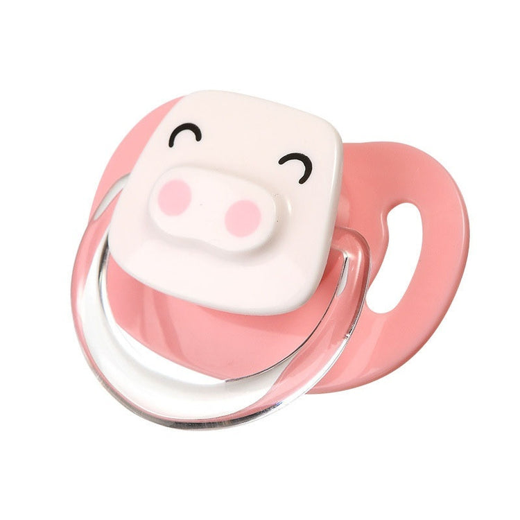 a pink pacifier with a pig face