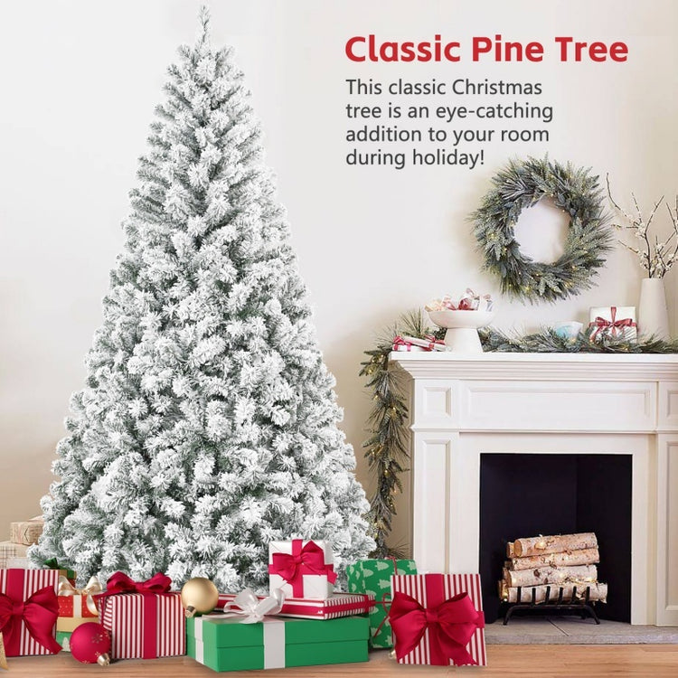 a christmas tree with presents and a fireplace